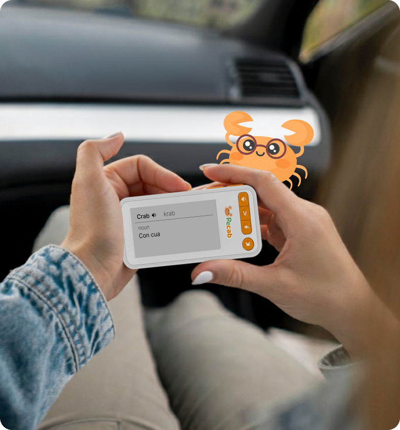 Hand holding Recab device outdoors